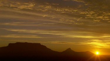 Sun setting over Cape Town, Table Mountain and Lion's Head