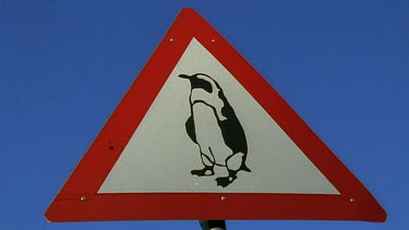 road sign of a penguin