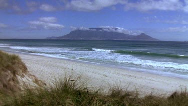 View of sea with cloud covered Table Mountain in BG