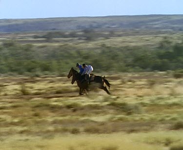 Horse racing in outback.