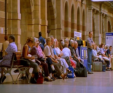 Central Station, Sydney. Clock and trains, platform passengers