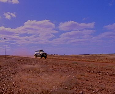 4 WD Four wheel-drive in outback, red earth