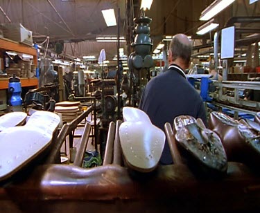 R.M. Williams bootmakers cutting leather