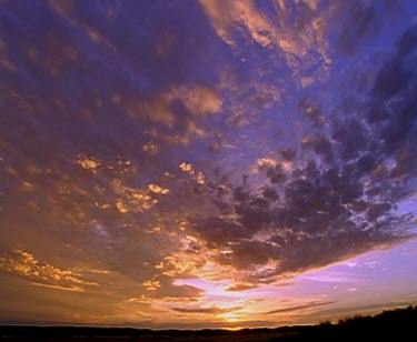 Sunset pink and blue clouds