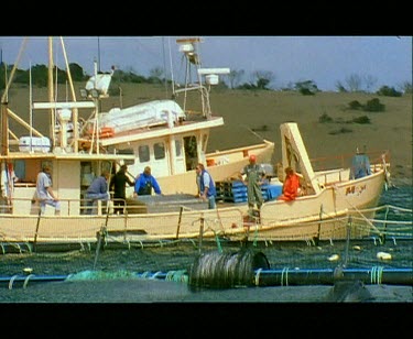 Boat alongside Blue fin tuna nets.