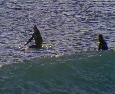 Paddling on surf board