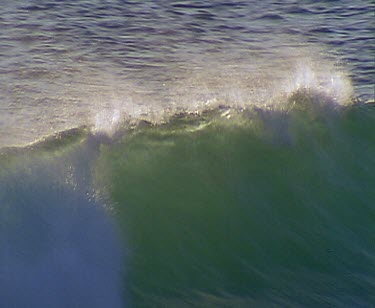 Wave crashing surf and spray