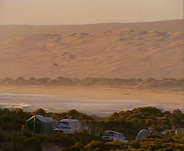 Camping at Cactus Beach. Large sand dunes in background