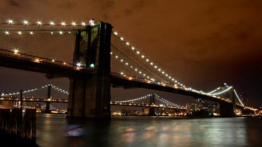 A beautiful timelapse of Brooklyn Bridge, New York at night.