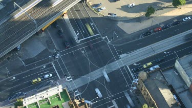 Experience a birdseye view of the hectic traffic i  busy intersection.