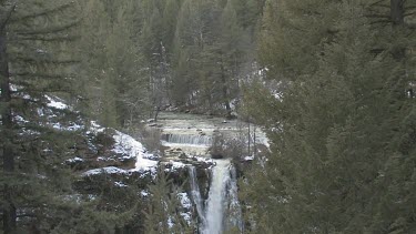 Powerful waterfall in winter