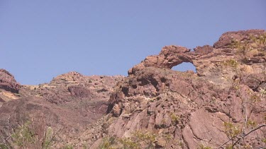 Rocky Canyon arch; sheer and deep; monumental buttes, mesas, and boulders