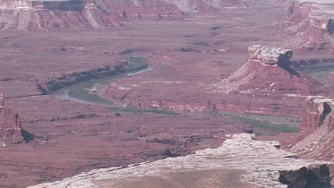 Rocky Canyon River; sheer and deep; monumental buttes, boulders, and mesas