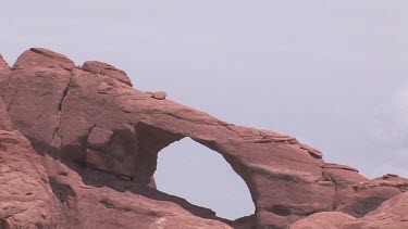 Rocky Canyon Arch; sheer and deep; monumental buttes, boulders, and mesas