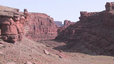 Rocky Canyon; sheer and deep; monumental buttes, boulders, and mesas