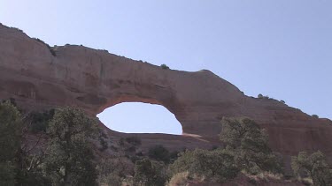 Rocky Canyon Arch; sheer and deep; monumental buttes, boulders, and mesas