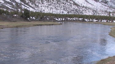 A Rocky Mountain river in early Spring; the Madison River