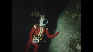 Valerie attempting to photograph scorpion fish at night