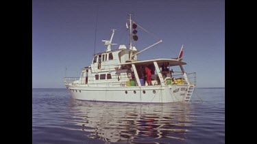 Divers at stern of reef Explorer