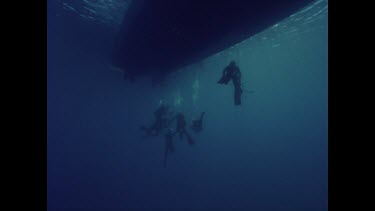 divers with boat equipment