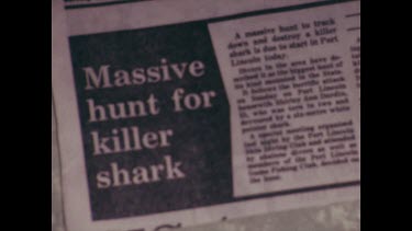 newpaper article, fear of sharks killer sharks