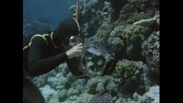 Ron Taylor filming underwater