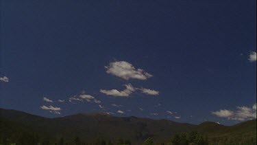 Timelapse of Timelapse of Boiling Clouds Over Mountains