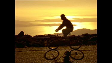 Cyclists, Mount Wellington, sunset
