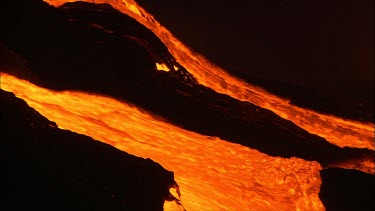 Volcano. Lava flow. Night
