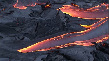 CU lava flowing along channel right into the ocean.