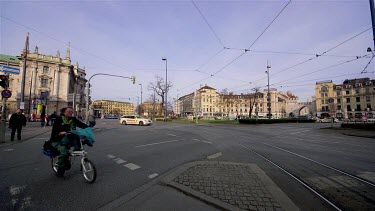 Traffic & Blue Trams At Junction, Karlsplatz, Munich, Germany