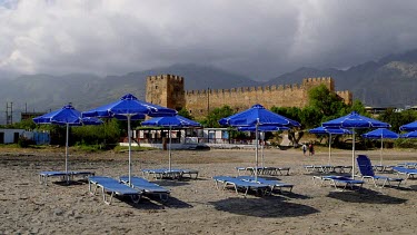 Blue Sun Beds, Parasols, Castle & Mountains, Frangokastello, Crete, Greece