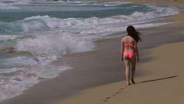 Teenage Girl On Beach In Pink Bikini, Falasarna, Crete, Greece