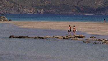 People Walking In Elafonisi Lagoon, Elafonisi, Crete, Greece