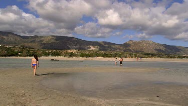 Teenage Girl On Beach In Blue Bikini, Elafonisi, Crete, Greece