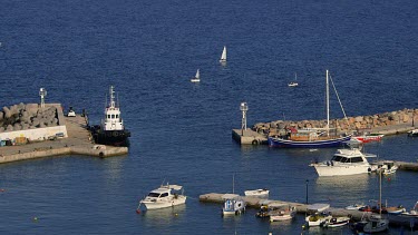 Pleasure Boats & Tug In Harbour, Pantanassa, Crete, Greece