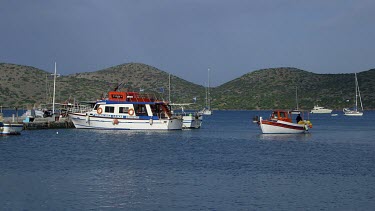 Fishing Boat Approaches Harbour, Elounda, Crete, Greece