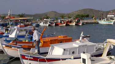Man Walks Of Pleasure Boat, Elounda, Crete, Greece