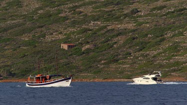 Pleasure Boats Pass Near Island, Elounda, Crete, Greece