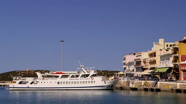 Nostos Cruise Boat In Harbour & Facade, Agio Nikolaos, Crete, Greece