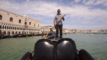 Gondolier & Doge'S Palace, Venice, Italy