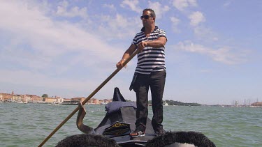 Gondolier On Gondola, Venice, Italy