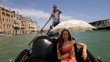 Woman With Parasol & Gondolier, Venice, Italy