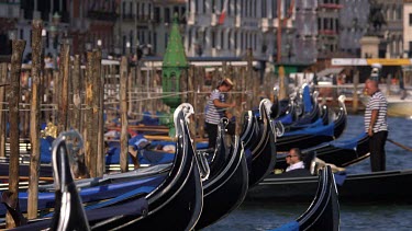 Gondolas Bobbing In Water, Venice, Italy
