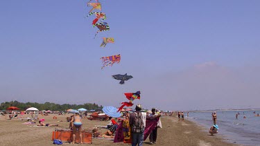 Kite Seller & Tourists On Beach, Lido, Venice, Italy