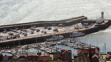 Yachts In Marina & Lighthouse, South Bay, Scarborough, North Yorkshire, England, United Kingdom