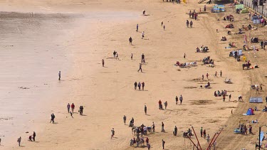 Tourists On South Bay Beach, South Bay, Scarborough, North Yorkshire, England, United Kingdom