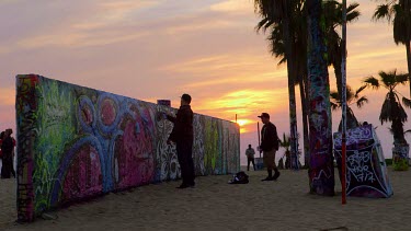 Graffiti Artist At Sunset, Venice Beach, Venice, California, Usa