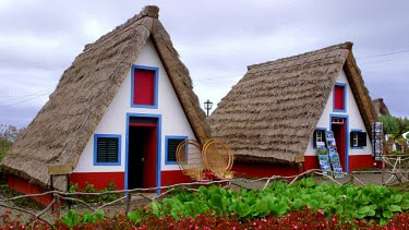 Tourist Views Traditional Thatched Triangular Houses, Santana, Madeira, Portugal