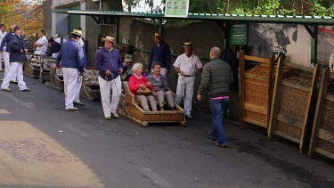 Tourists At Start Of Sleigh Ride, Carros De Cesto, Monte, Funchal, Madeira, Portugal